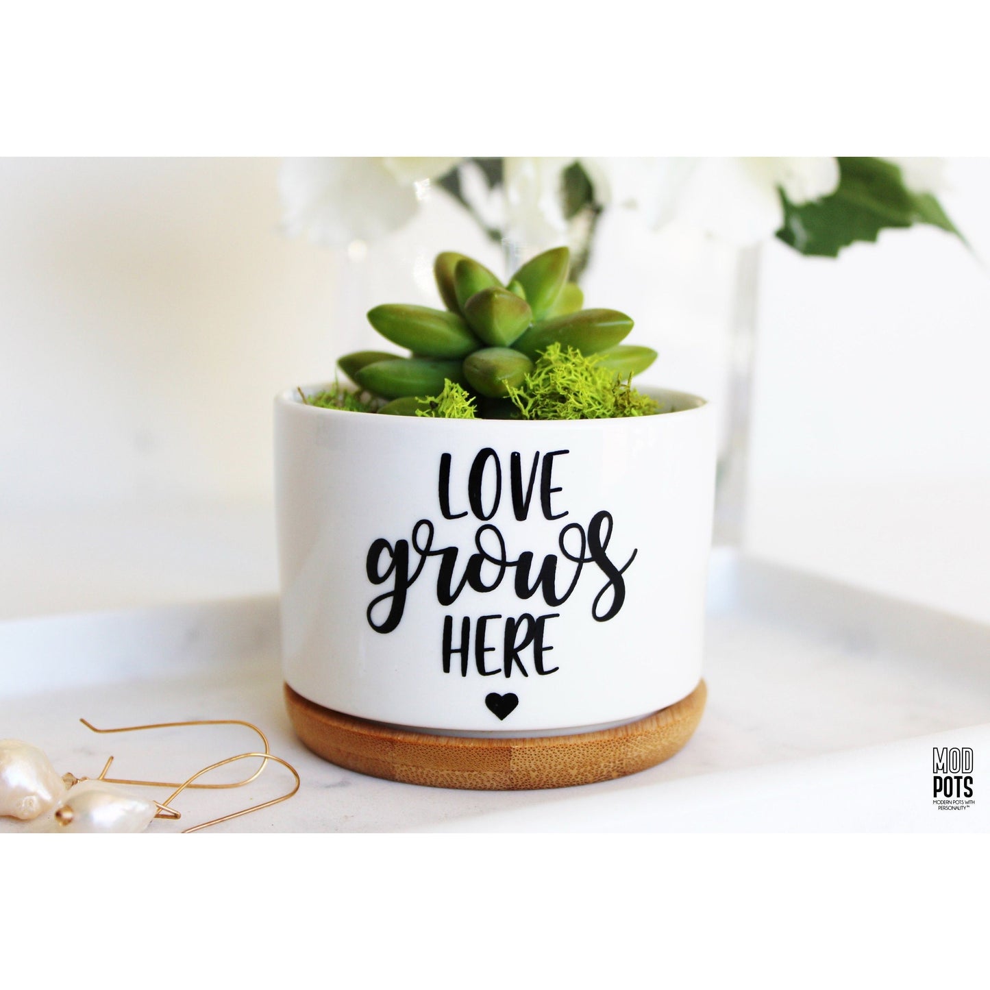 Love Grows Here with Small Black Heart